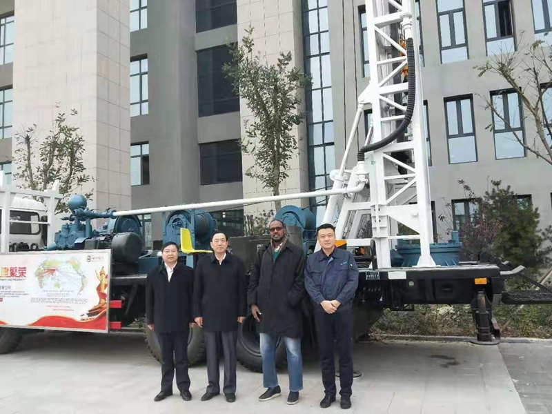 Foreign businessmen inspect our 600 meter drilling rig